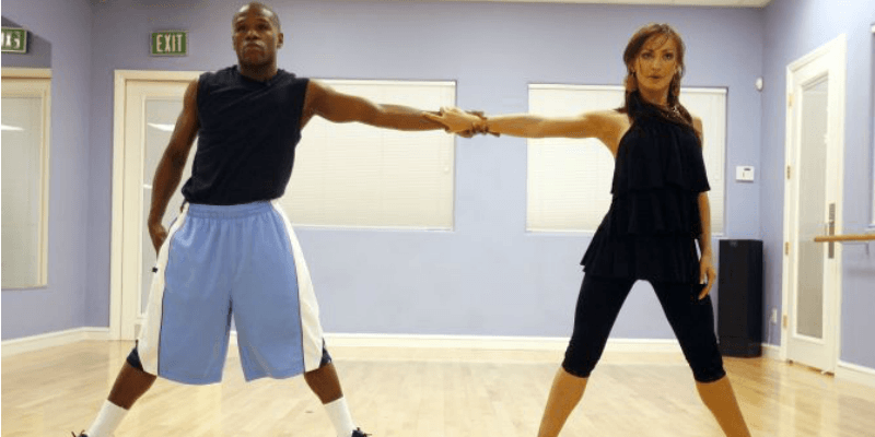 Floyd Mayweather Jr. and Karina Smirnoff practicing on Dancing With the Stars.