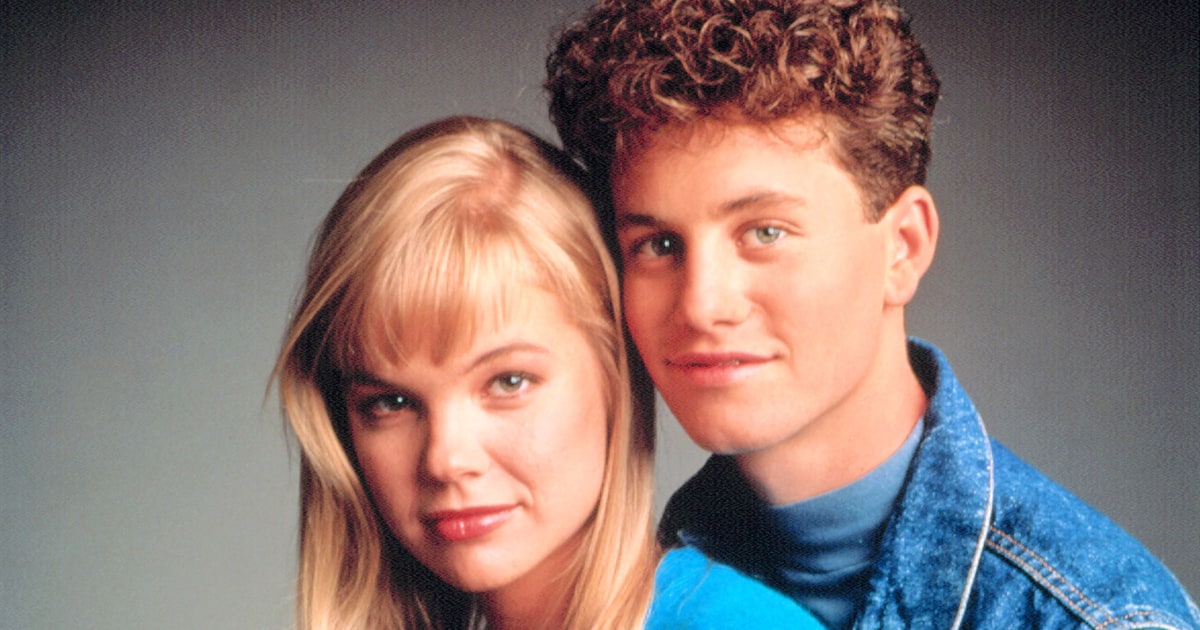Kirk Cameron and Julie McCullough pose closely together for Growing Pains.