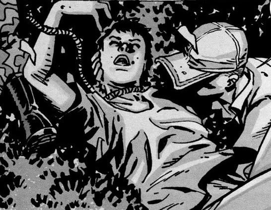 Glenn rescues Maggie, with a rope around her neck, in a panel from 'The Walking Dead' comics.
