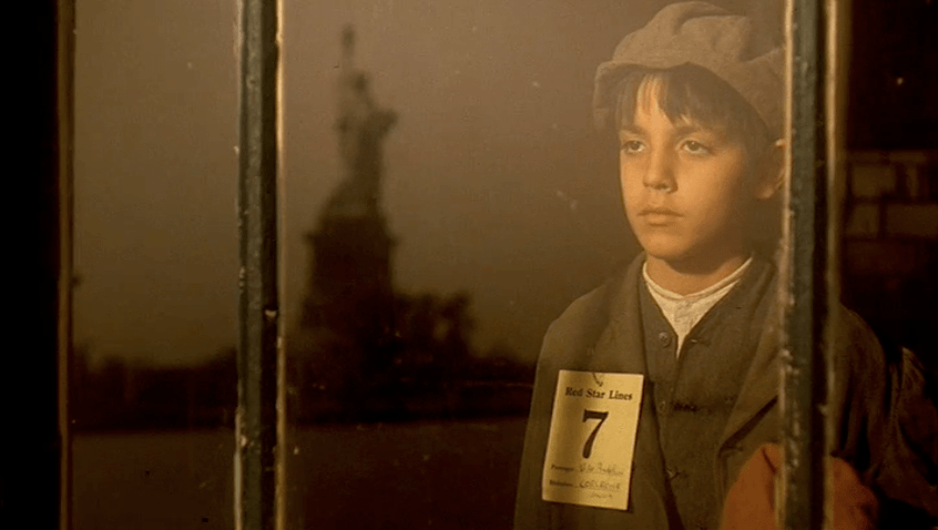 A young immigrant, Vito Corleone in the 'Godfather Part II', looks at the Statue of Liberty