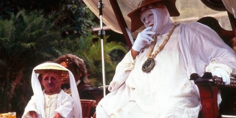 Marlon Brando sits down as Dr. Moreau in The Island of Dr. Moreau