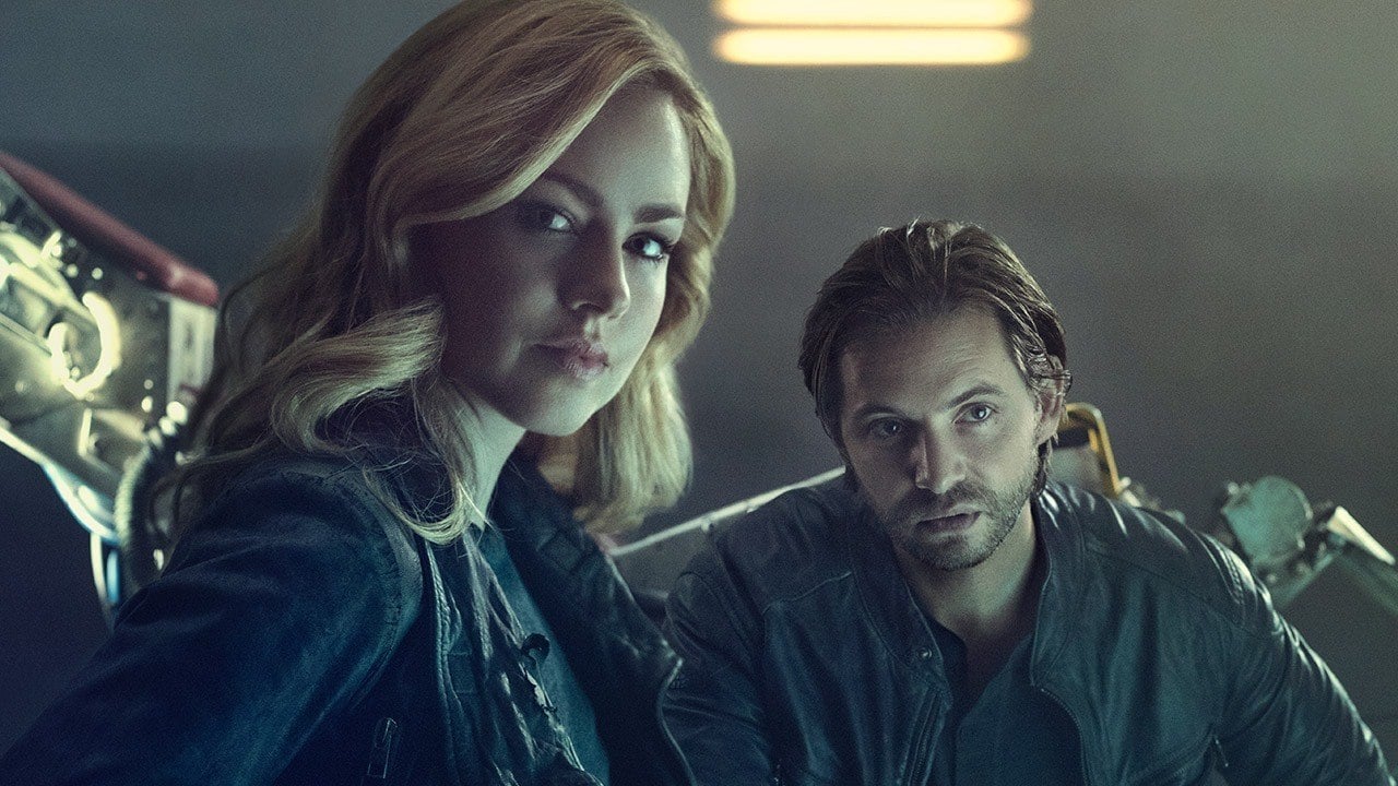  Aaron Stanford and Amanda Schull pose together in a poster from 12 Monkeys