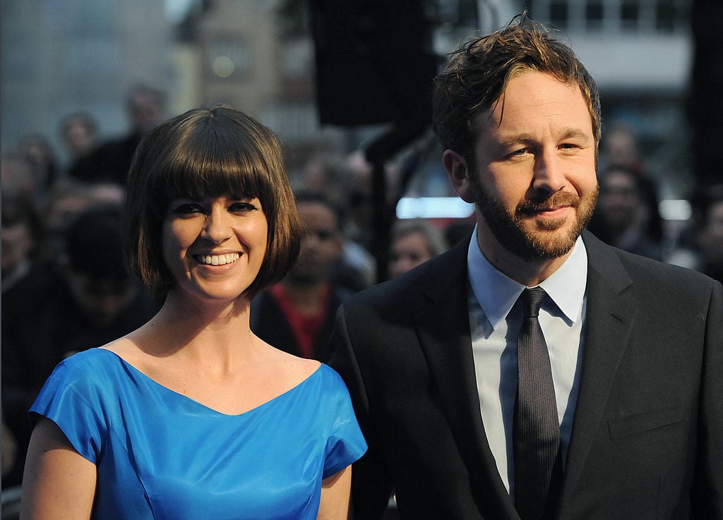 Chris O'Dowd and Dawn Porter smiling together, dressed up on the red carpet