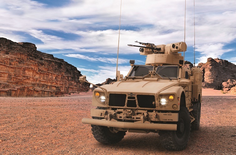 An M-ATV Assault vehicle in the desert.