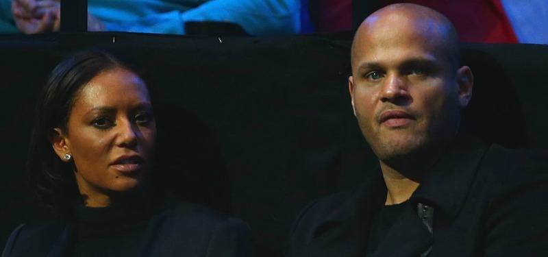 Mel B and Stephen Belafonte are sitting down in the audience of a competition.