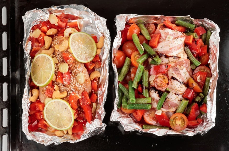 Roasting pan with two uncooked dishes
