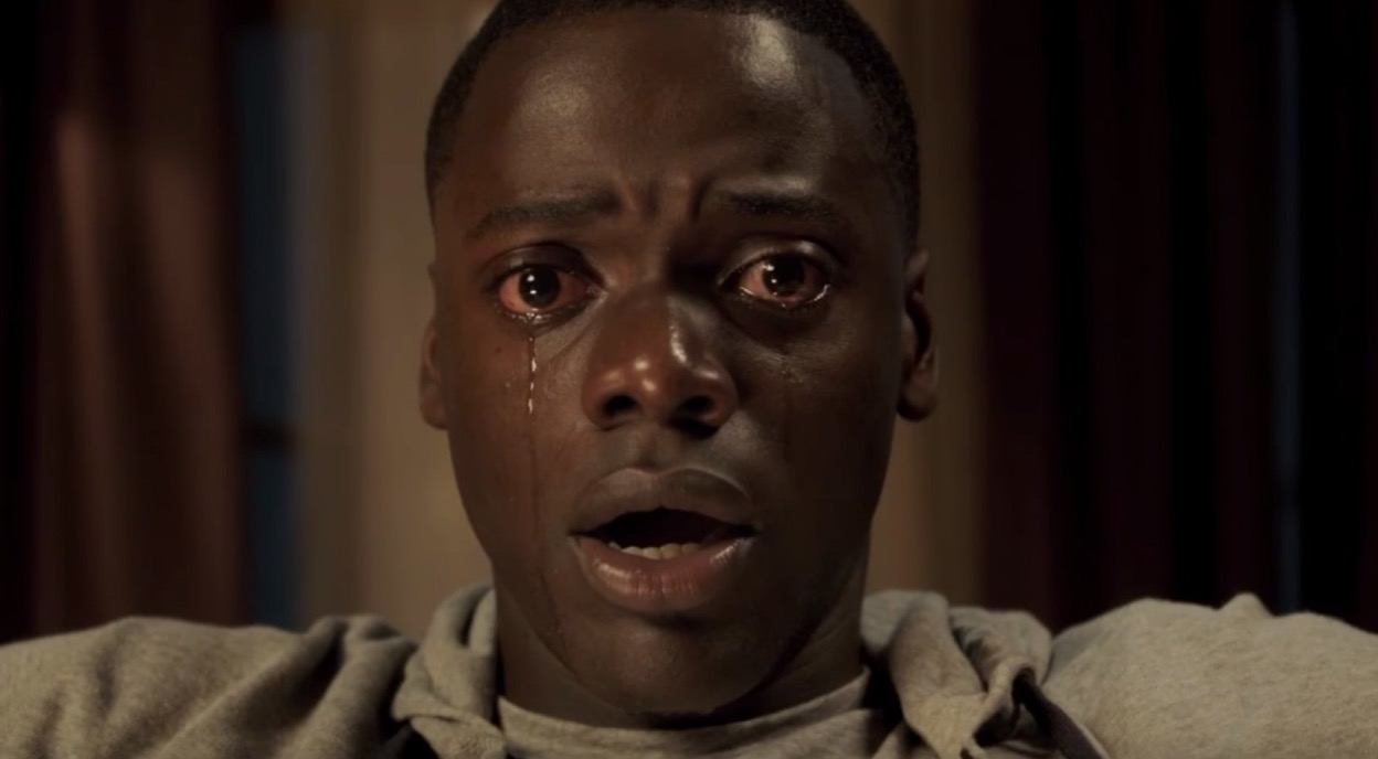 Daniel Kaluuya as Chris Washington staring straight into the camera, crying in 'Get Out'