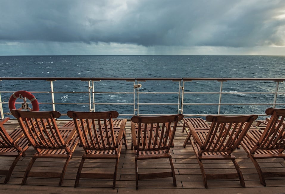 ship deck overlooking storm clouds