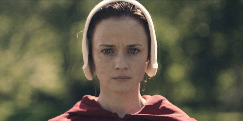 Ofglen looks straight ahead seriously in The Handmaid's Tale.