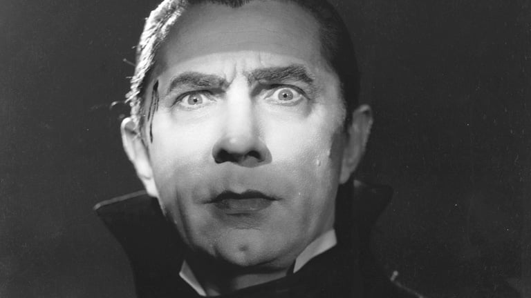 A close-up on Bela Lugosi'a face in Dracula