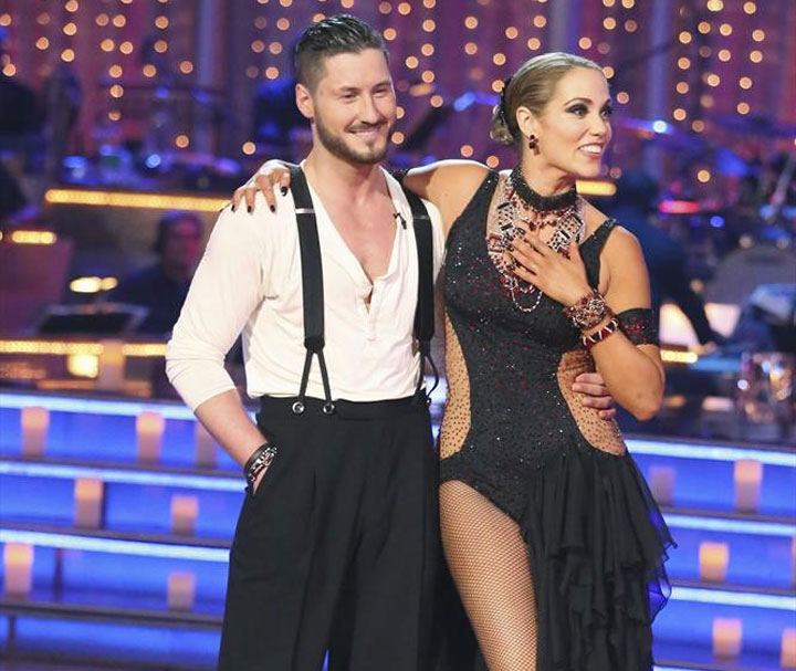 Val Chmerkovskiy and Elizabeth Berkley stand with their arms around one another on 'Dancing With the Stars.'