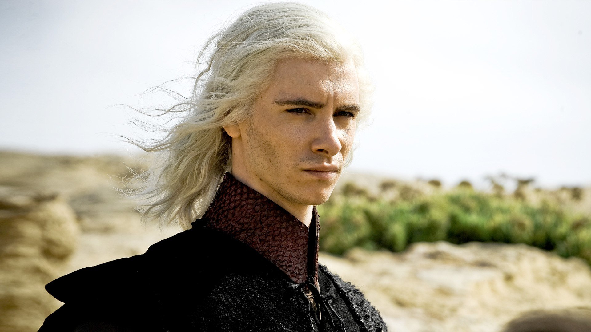 Viserys stands in the desert, with the wind blowing in his hair, in a scene from 'Game of Thrones.'