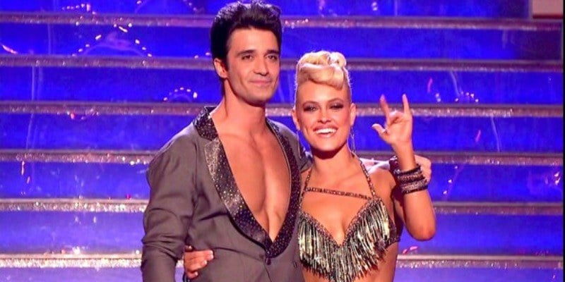 Gilles Marini and Peta Murgatroyd have their arms around each other and she had a hand up in the air.
