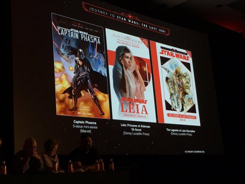 Cover art for three "Journey to The Last Jedi" publications, on-stage at a Del Rey Star Wars panel