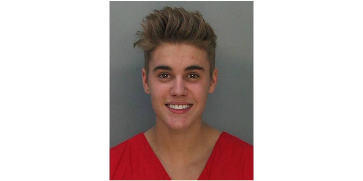 Justin Bieber smiles in his mugshot, taken in January 2014.