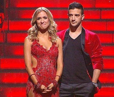 Kristin Cavallari wears a red fringe dress and Mark Ballas wears a matching red and black blazer on 'Dancing With the Stars.'