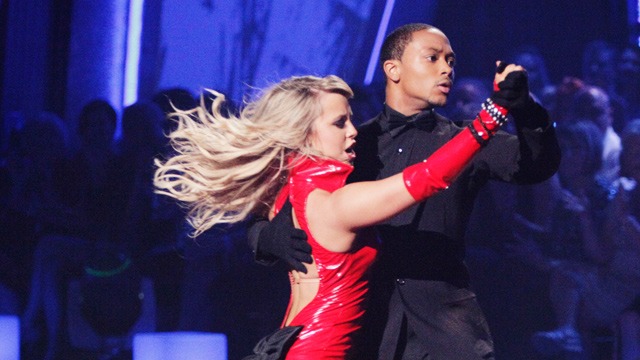 Chelsie Hightower wears a red rubber outfit and Romeo Miller wears all black as they dance on 'Dancing With the Stars.'