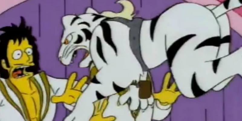 A man is screaming as a white tiger is lunging at him on The Simpsons.