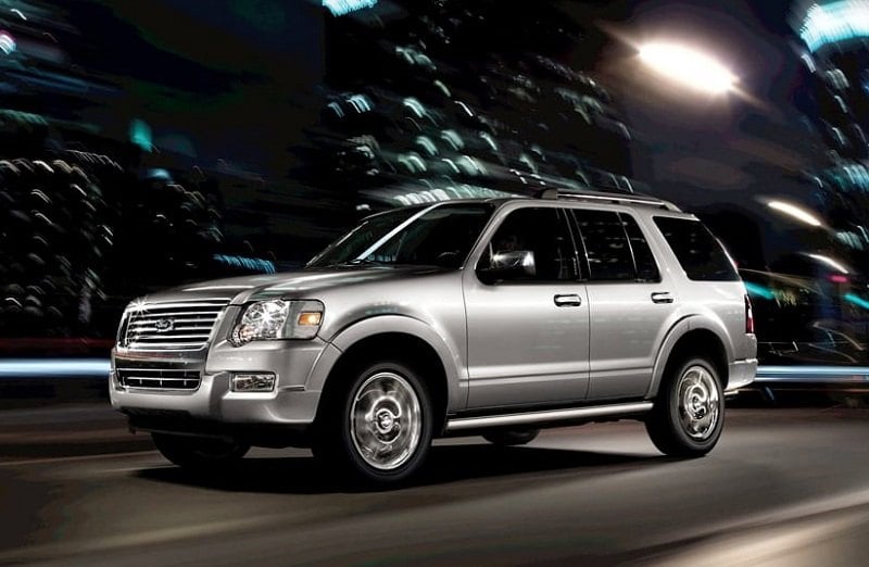 Shot of 2009 Ford Explorer driving on city streets at night