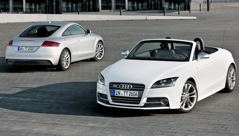 View of 2010 Audi TT Roadster with rear view of coupe model in background