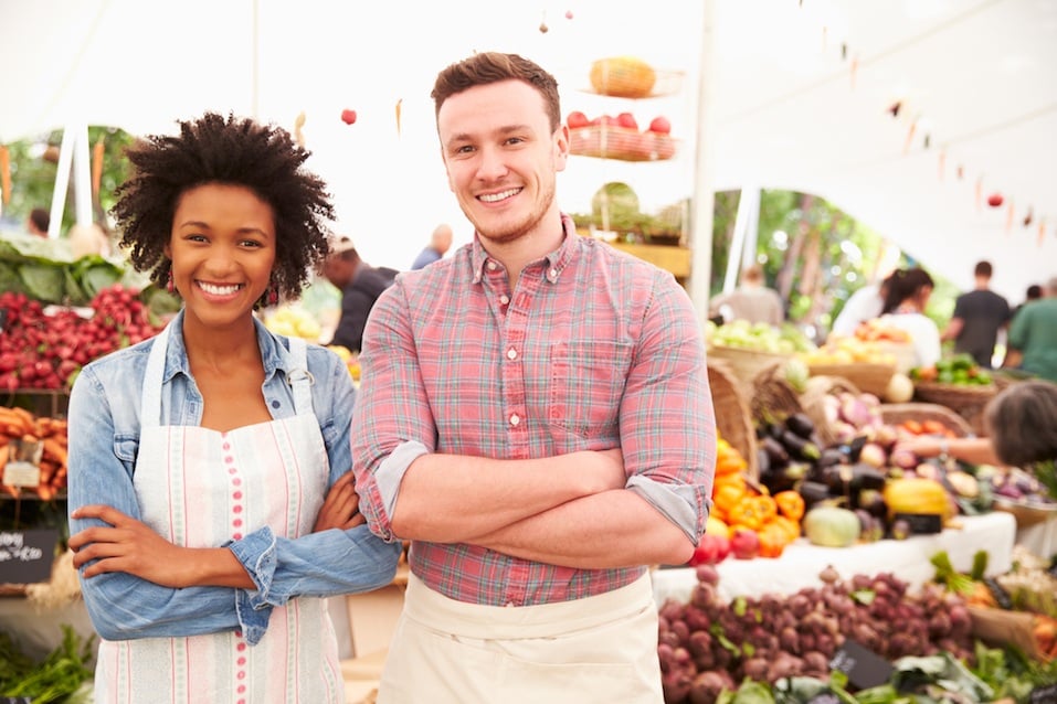 two vendors at farmers market