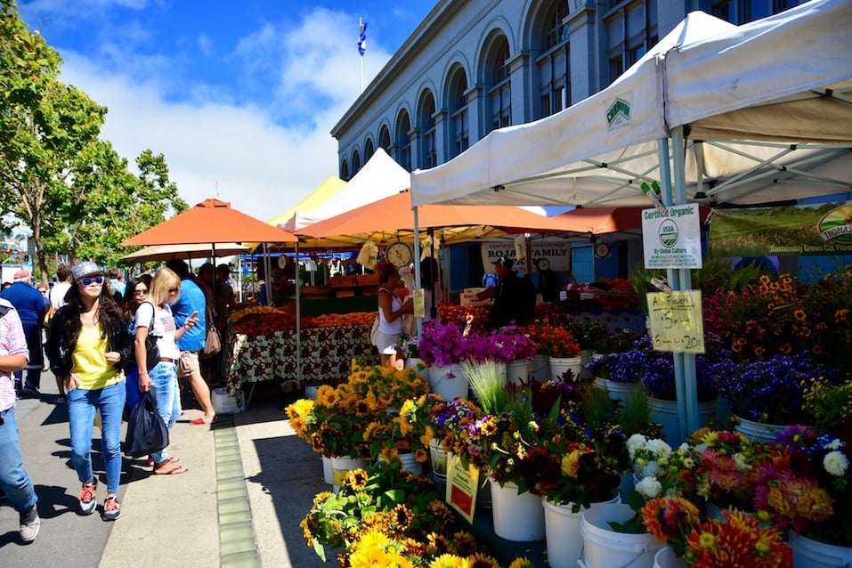 Selling flowers at organic farmers market