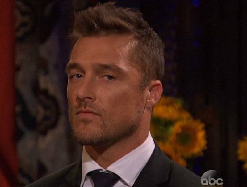 Chris Soules is wearing a black suit and is looking serious.