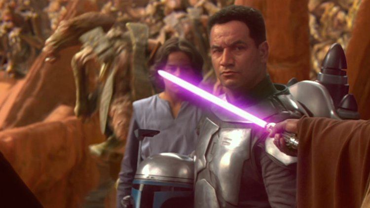 Jango Fett with his helmet off, as Mace Windu holds his purple lightsaber up to his neck threateningly