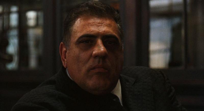 Luca Brasi looks into the camera on The Godfather