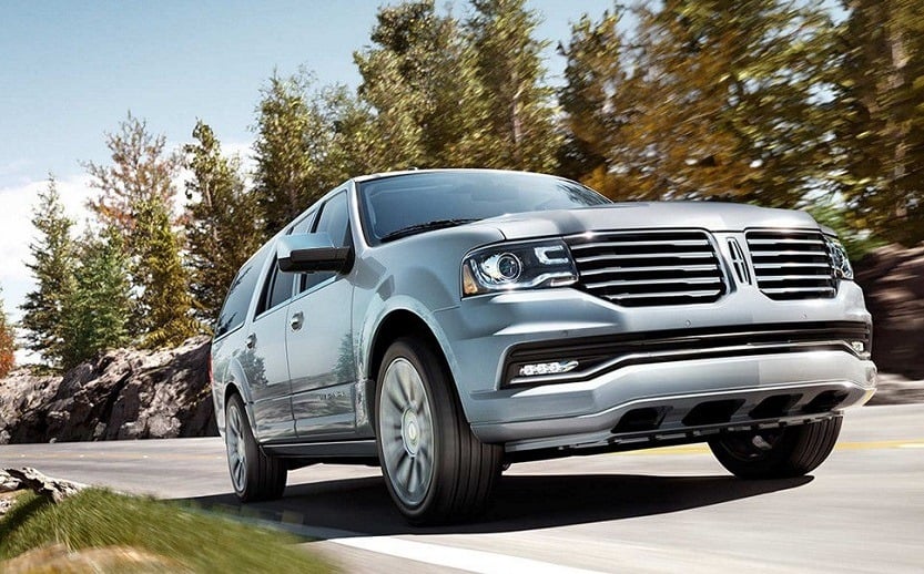 Low-angle view of blue Lincoln Navigator