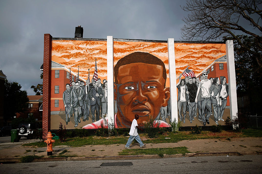 A mural of Freddie Gray near the location where he was arrested