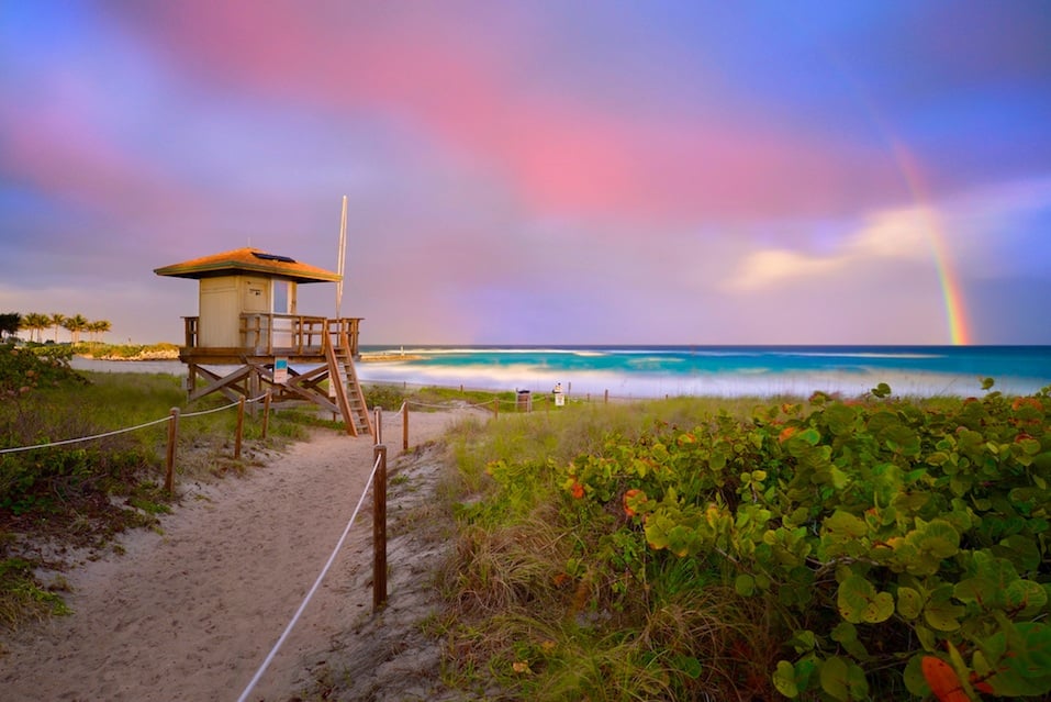 Sunset with rainbow at Boca Raton beach, Florida