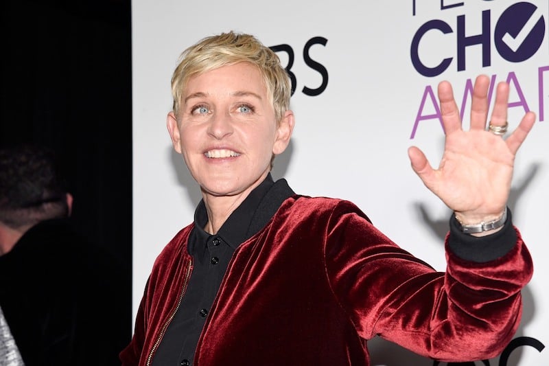 Ellen Degeneres waves in the press room during the People's Choice Awards