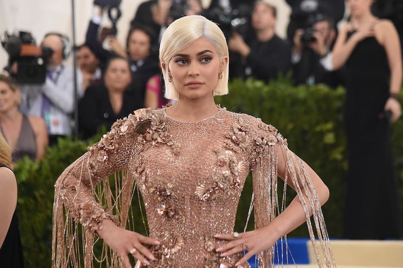 Kylie Jenner poses on the red carpet at the 'Rei Kawakubo/Comme des Garcons: Art Of The In-Between' Costume Institute Gala at Metropolitan Museum of Art 