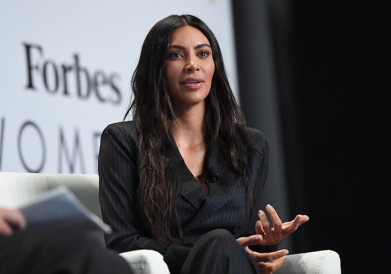 Kim Kardashian West speaks on stage with Steve Forbes at the 2017 Forbes Women's Summi