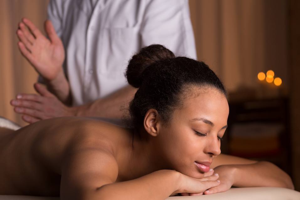 Woman relaxing in spa studio