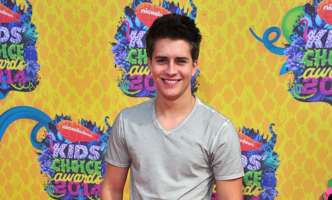Billy Unger smiles on the red carpet for the Kids' Choice Awards.
