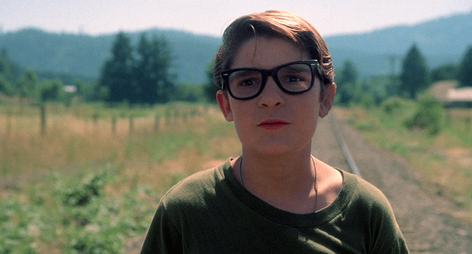 Corey Feldman looks concerned in a scene from 'Stand by Me.'