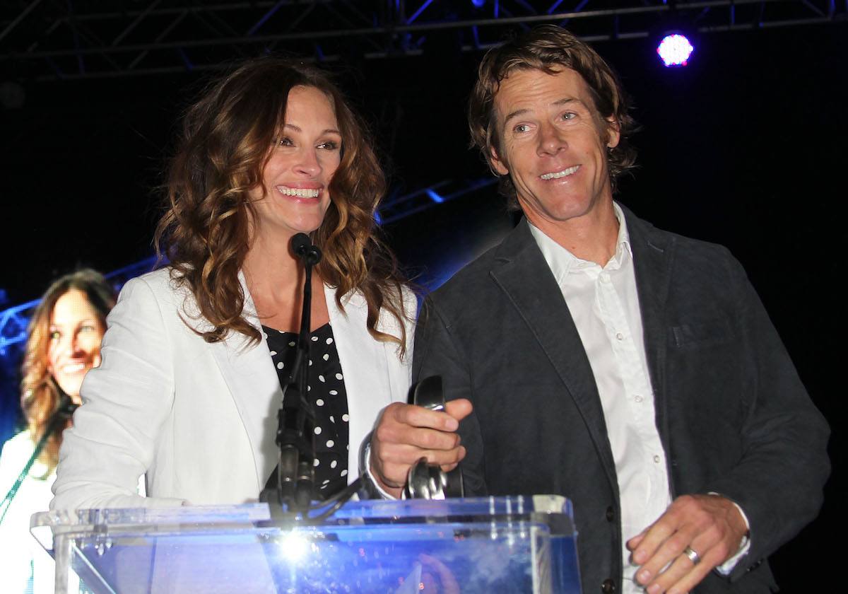 Actress Julia Roberts and husband Daniel Moder on stage at a fundraiser.