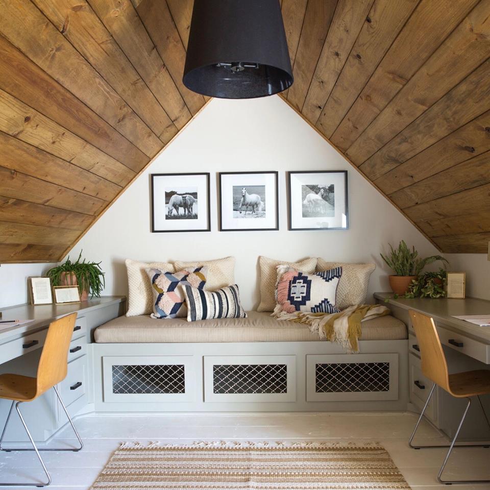 two desks in an attic room
