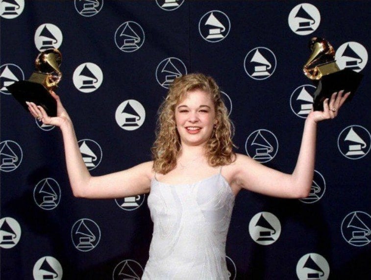 LeAnn Rimes holds up two Grammy Awards