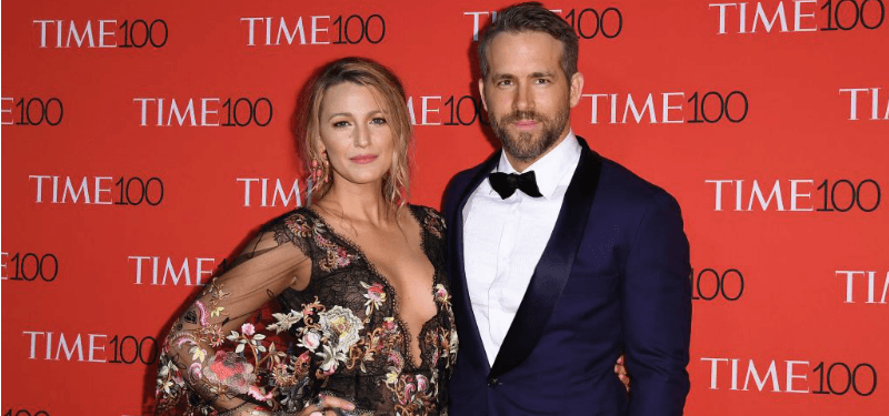 Blake Lively and Ryan Reynolds pose togethter on the red carpet.