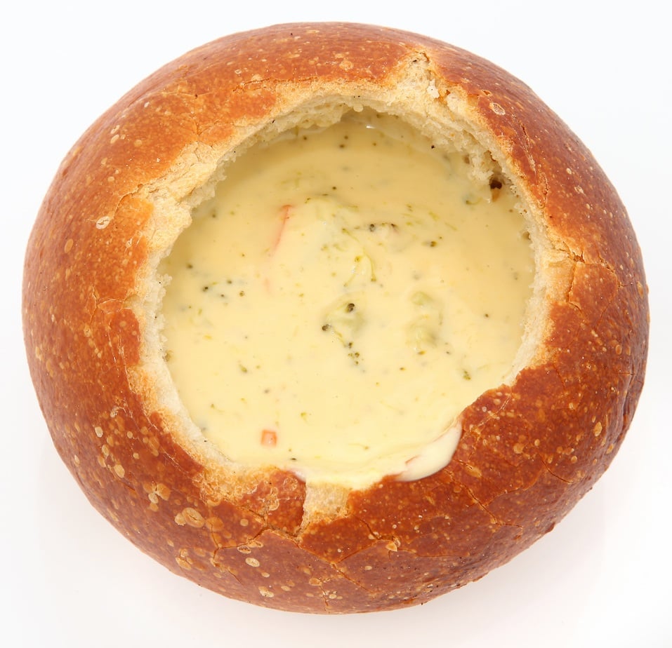 Sourdough bread filled with broccoli cheese soup