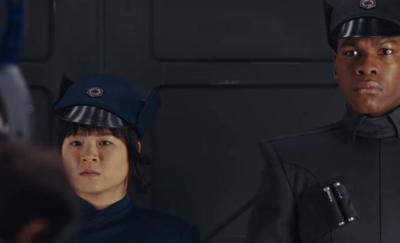John Boyega and Kelly Marie Tran wearing First Order uniforms while shooting The Last Jedi