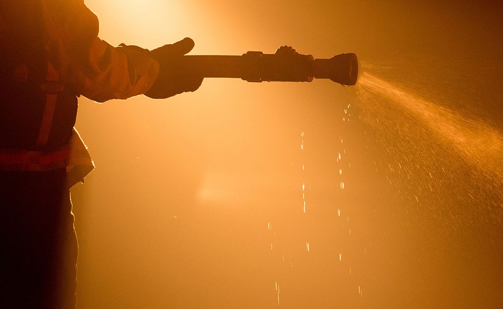 firefighter with hose