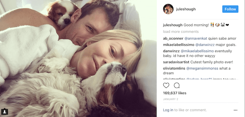 Brooks Laich and Julianne Hough lay in bed next to their two dogs