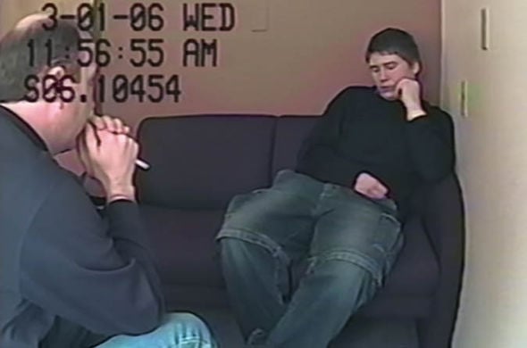Brendan Dassey sits in a chair and is interrogated by a police officer in Making a Murderer