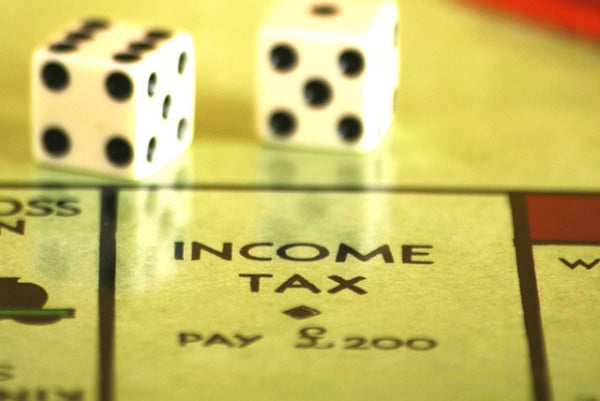 income tax monopoly dice debt