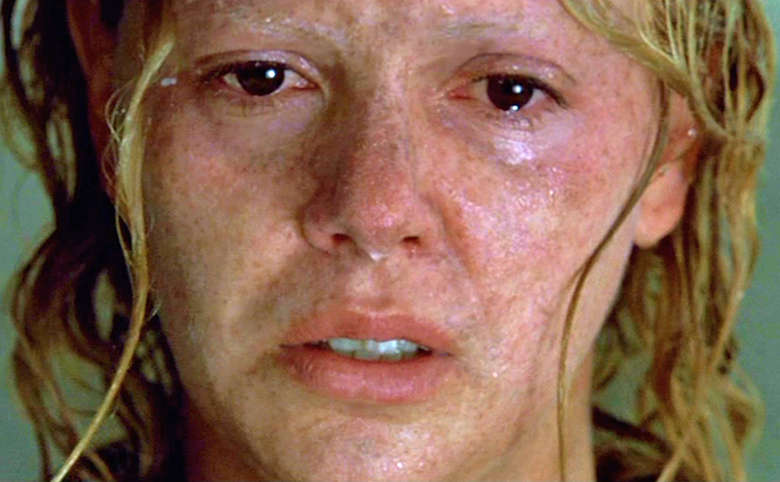 A close up on Charlize Theron in Monster, crying 