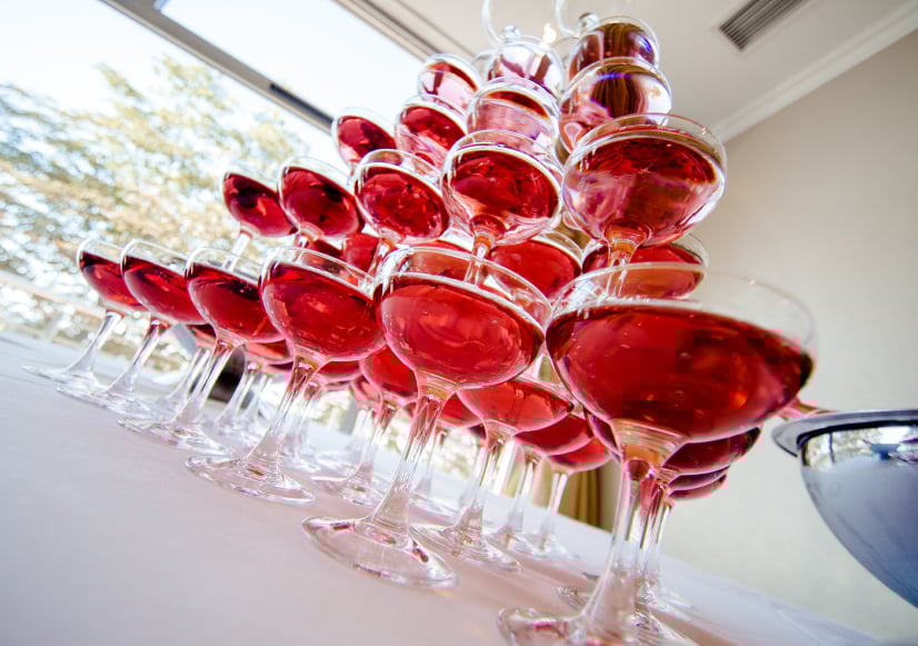 Pyramid of glasses of pink champagne